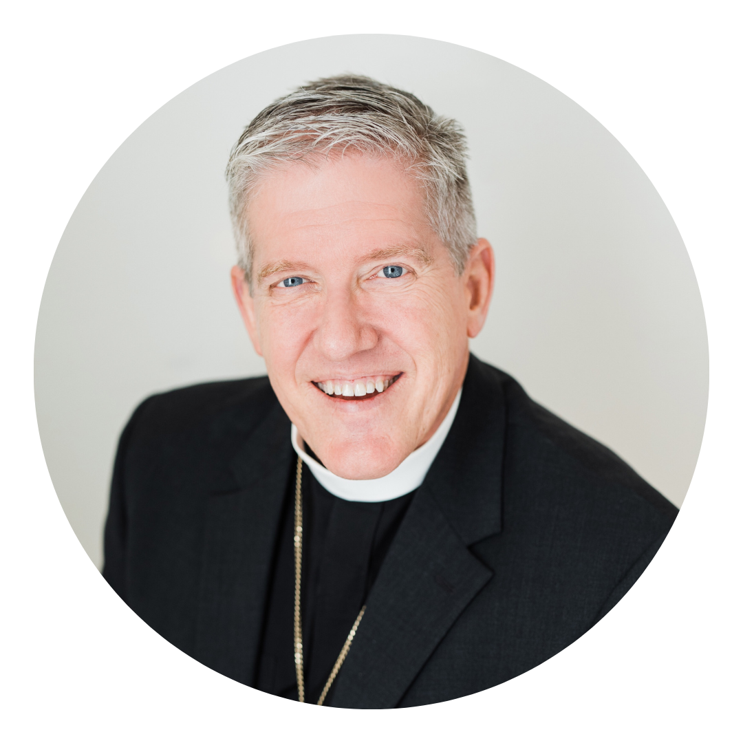 Bishop Michael Rinehart against a white background